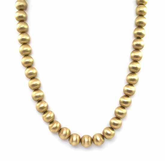 Appraisal: A Karat Yellow Gold Hollow Bead Necklace containing textured spherical