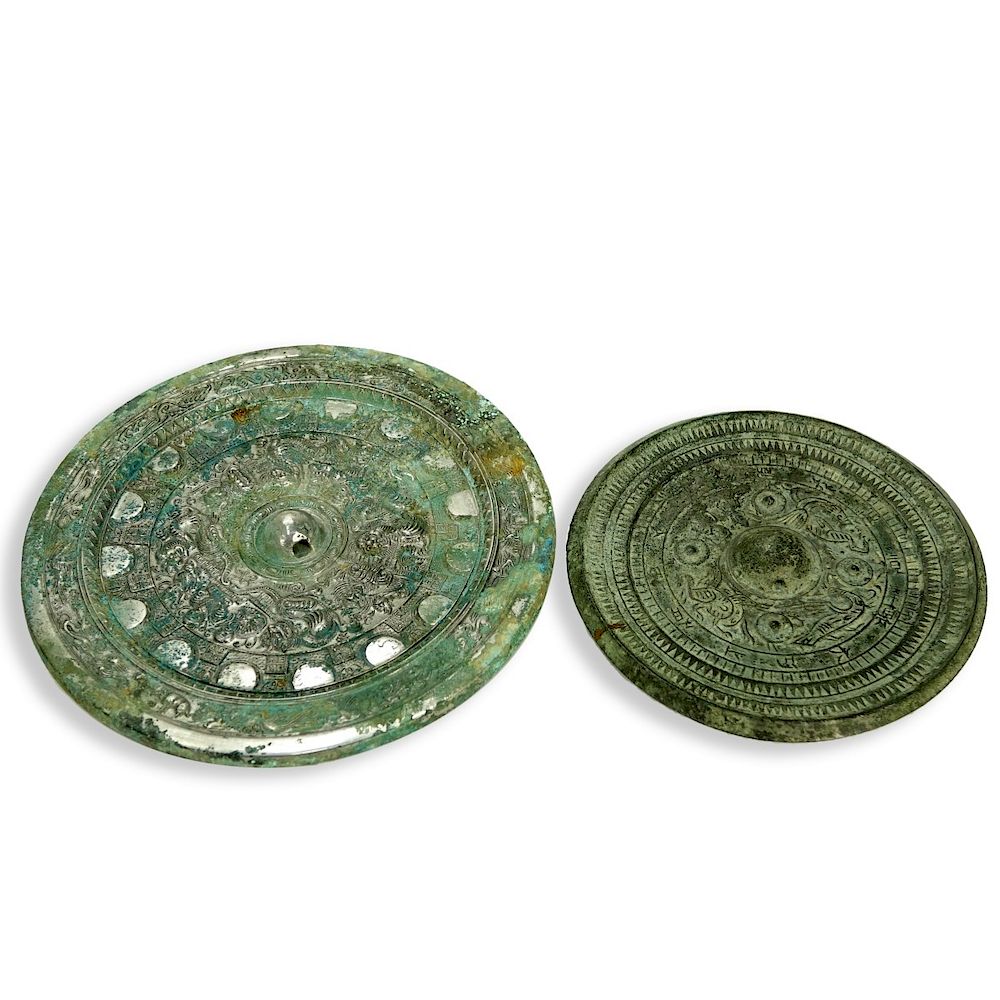 Appraisal: Two Chinese Mirrors Two Chinese Archaic Style Mirrors Raised symbols