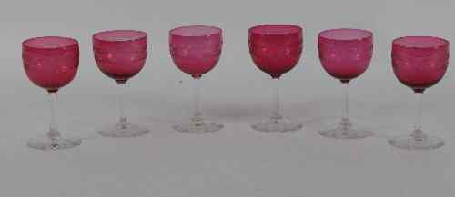 Appraisal: Six ruby tinted glasses with clear stems and circular bases