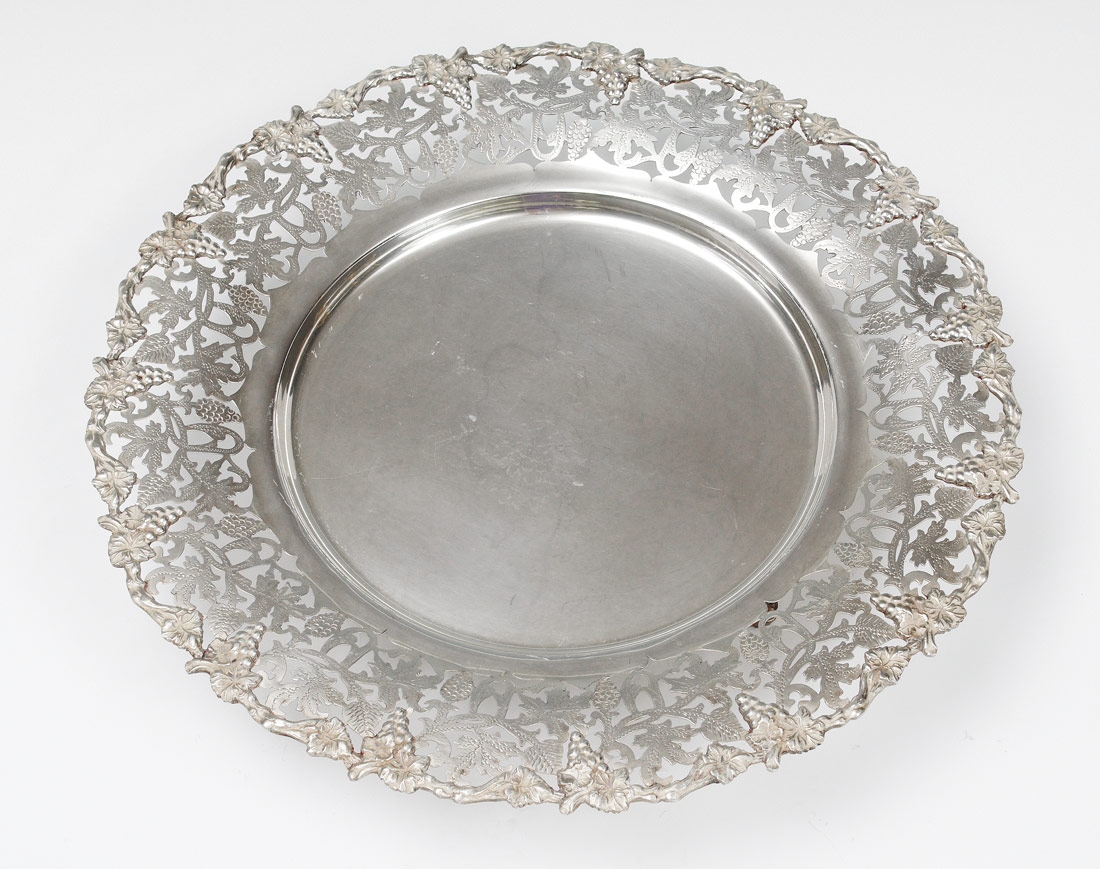 Appraisal: EGYPTIAN SILVER RETICULATED GRAPE VINE RIM TRAY Footed tray with