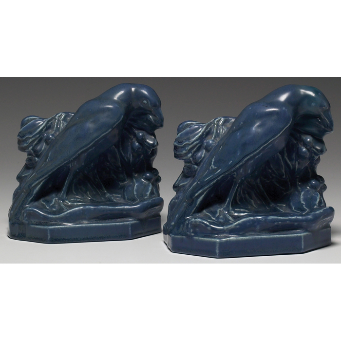 Appraisal: Rookwood bookends pair rook in front of leaves and berries