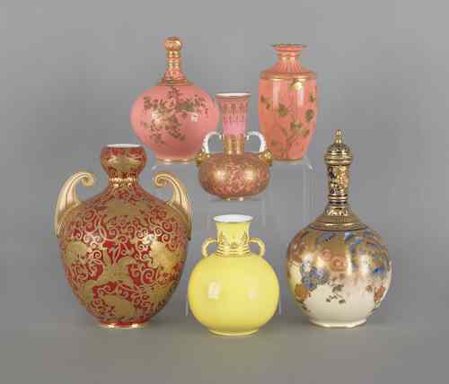 Appraisal: Four Royal Crown Derby vases h together with two bottles