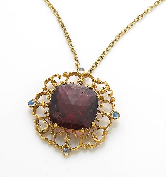 Appraisal: A red tourmaline moonstone gilt-silver pendant with chain tourmaline weighing