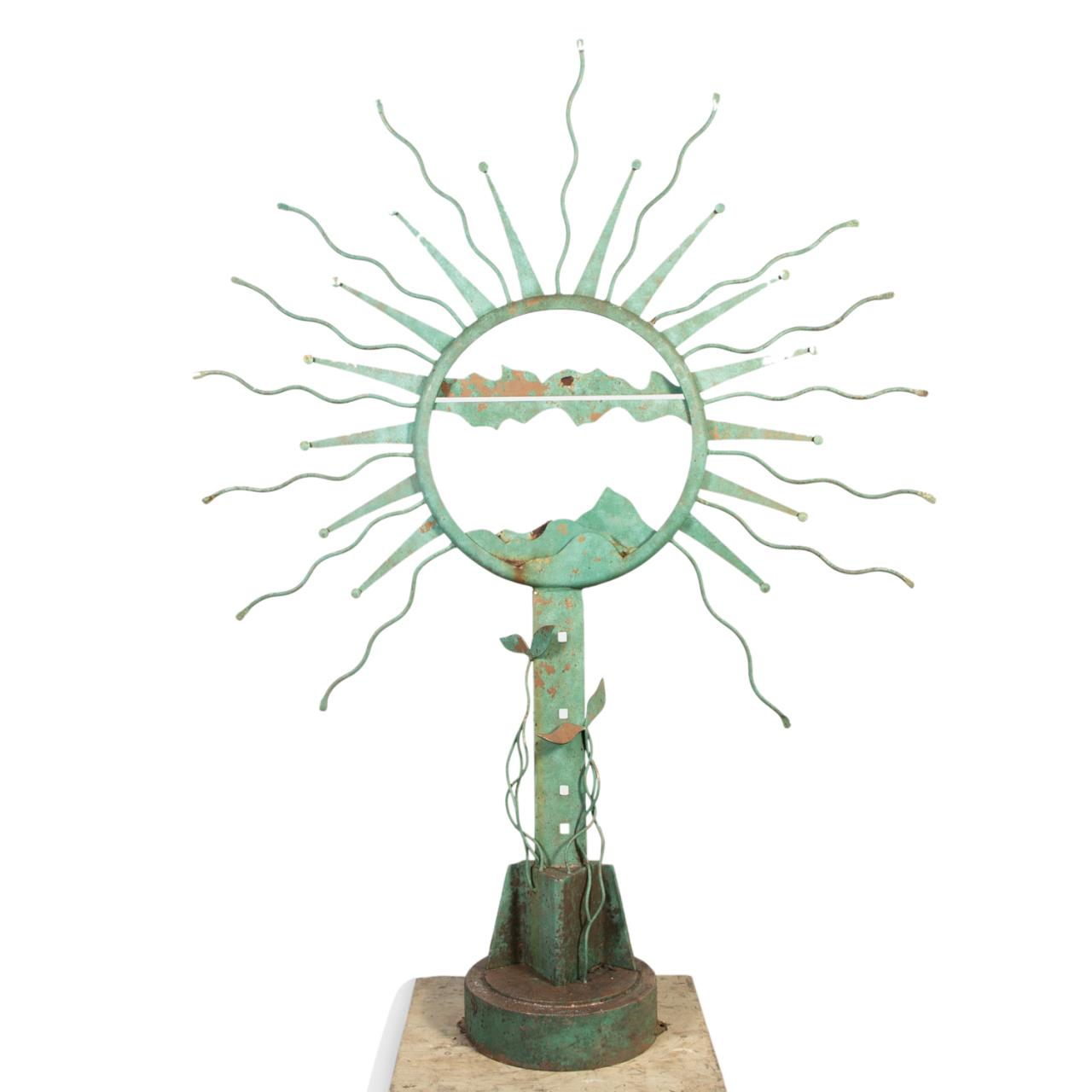 Appraisal: E STRAUSS IRON GARDEN GREEN SUN FORM SCULPTURE Eric Strauss