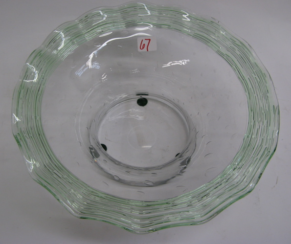 Appraisal: AN UNSIGNED STEUBEN GLASS CENTERPIECE BOWL controlled interior bubbles threaded