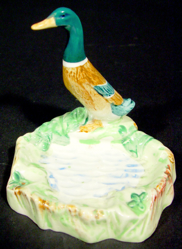 Appraisal: Beswick dish surmounted with a mallard duck above a pond