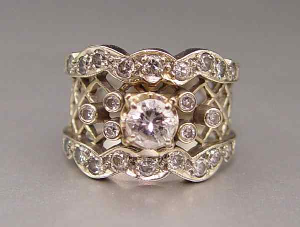 Appraisal: CTW DIAMOND LATTICE RING K white and yellow gold ring