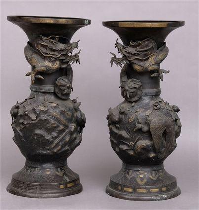 Appraisal: PAIR OF JAPANESE BRONZE VASES Each spherical bowl applied with