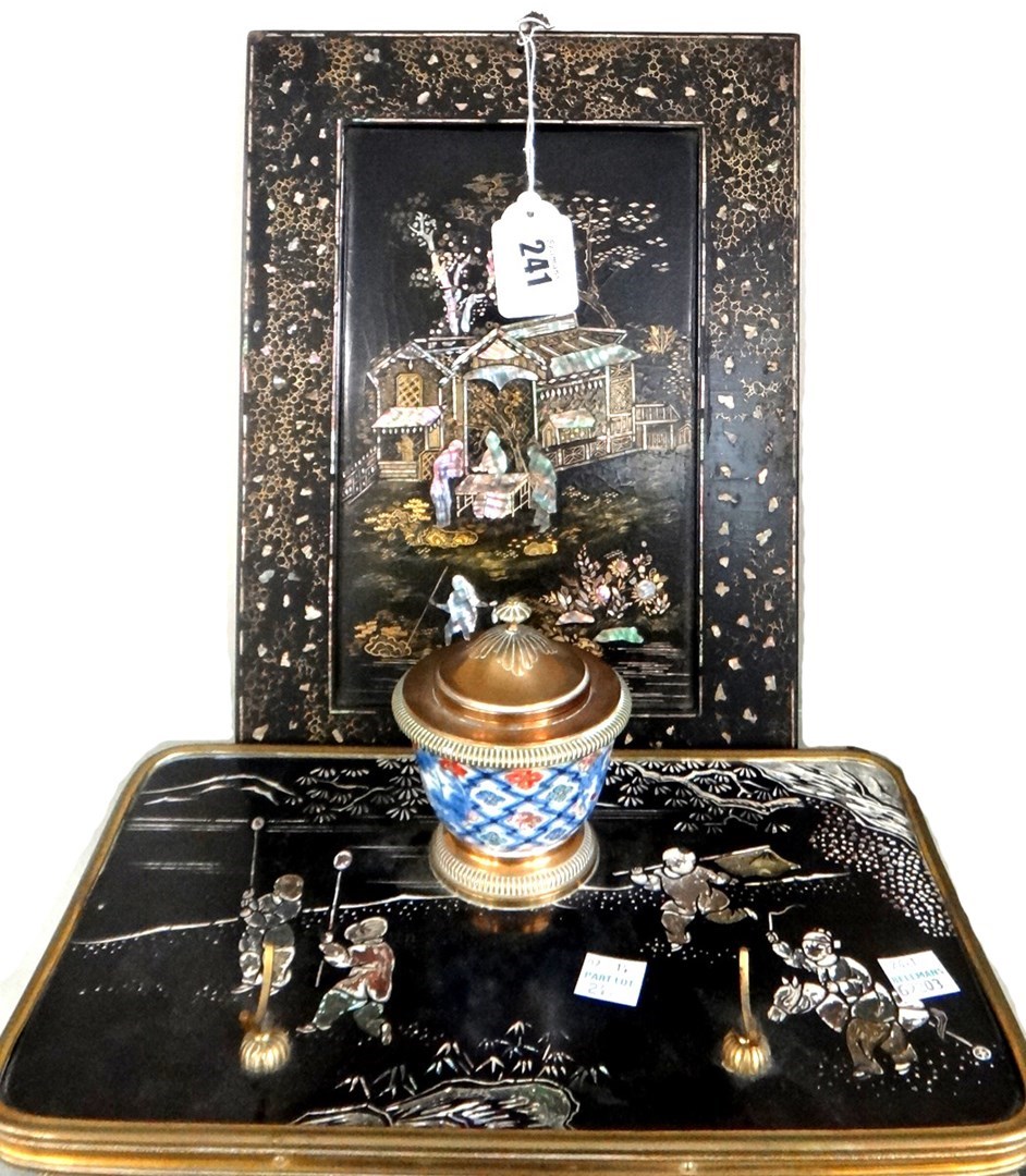 Appraisal: A Japanese black lacquer and inlaid mother-of-pearl rectangular panel decorated