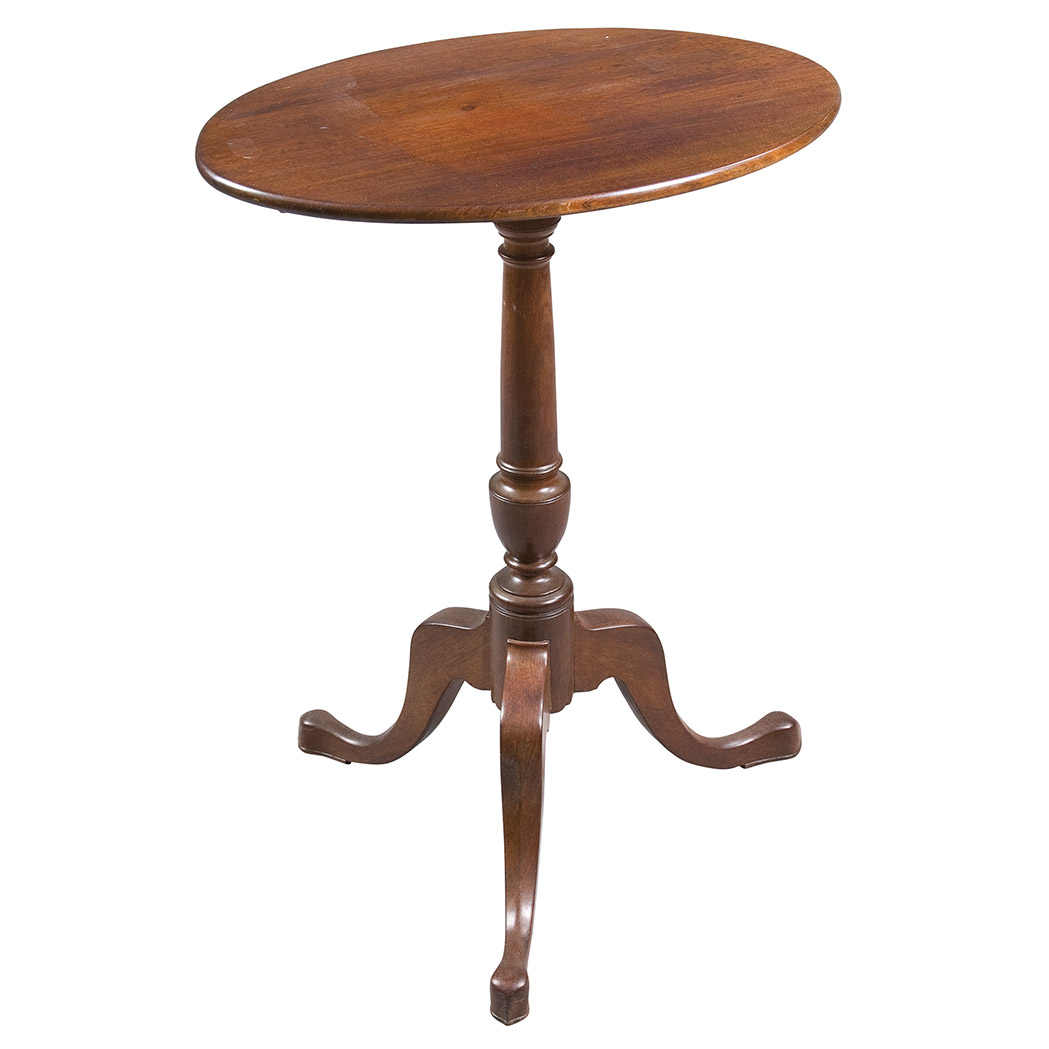 Appraisal: Federal Mahogany Tilt-Top Tripod Stand The oval top on a