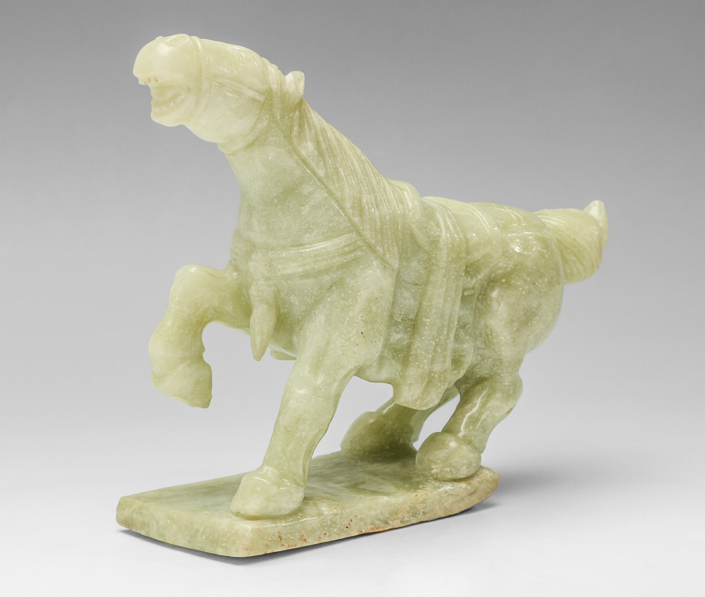 Appraisal: CHINESE CARVED STONE FIGURE OF A TANG HORSE Carved green