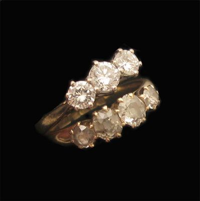 Appraisal: A diamond four stone ring set in ct gold and