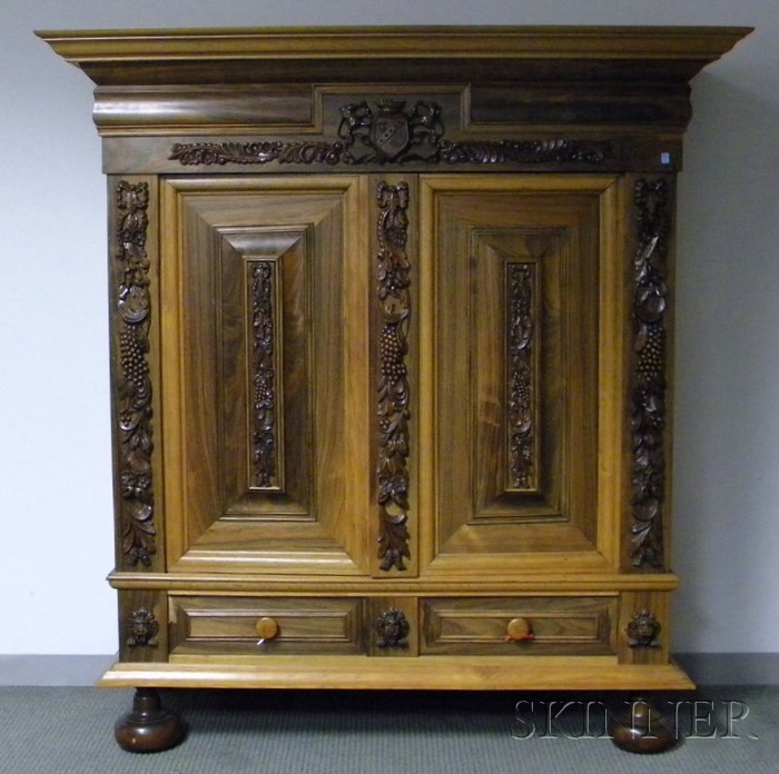 Appraisal: European Rosewood Oak and Carved Beechwood Two-Door Kas two short