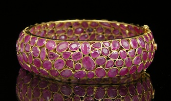 Appraisal: An Impressive Ruby and Gold Bangle Bracelet k yellow gold