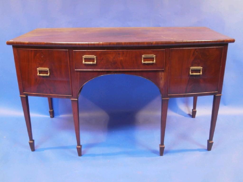 Appraisal: A George III flamed mahogany bow front sideboard with three