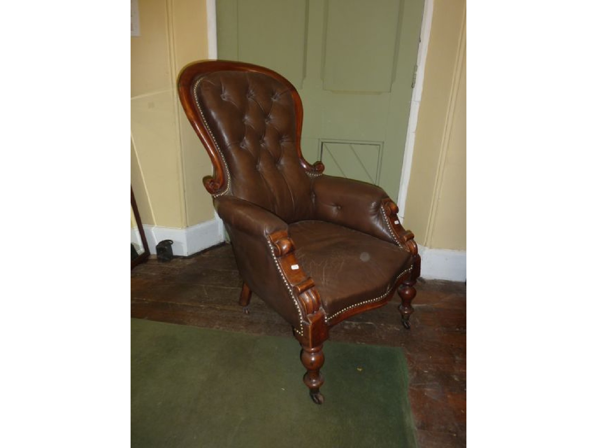 Appraisal: A Victorian drawing room chair with show wood frame with