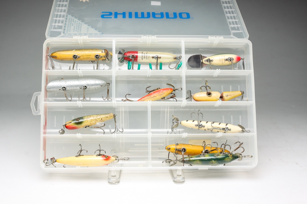 Appraisal: TWENTY-TWO FISHING LURES INCLUDING WOOD LURES American second half th