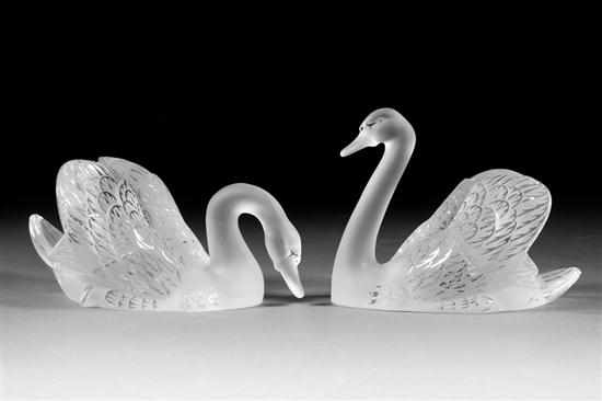 Appraisal: Pair of Lalique etched and partially frosted crystal swans with