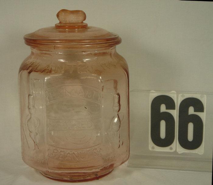 Appraisal: Vintage pink depression Mr Peanut Jar inches tall inches round