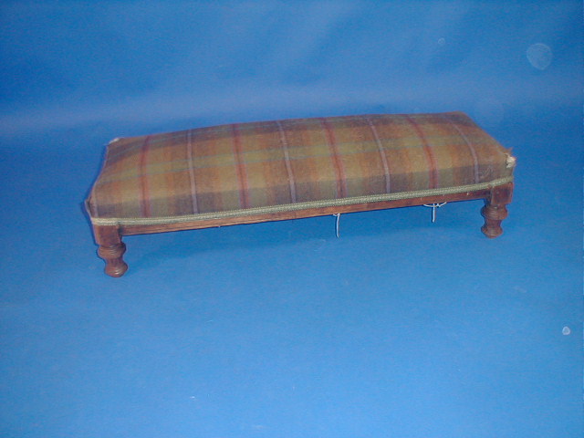 Appraisal: A Victorian oak rectangular footstool