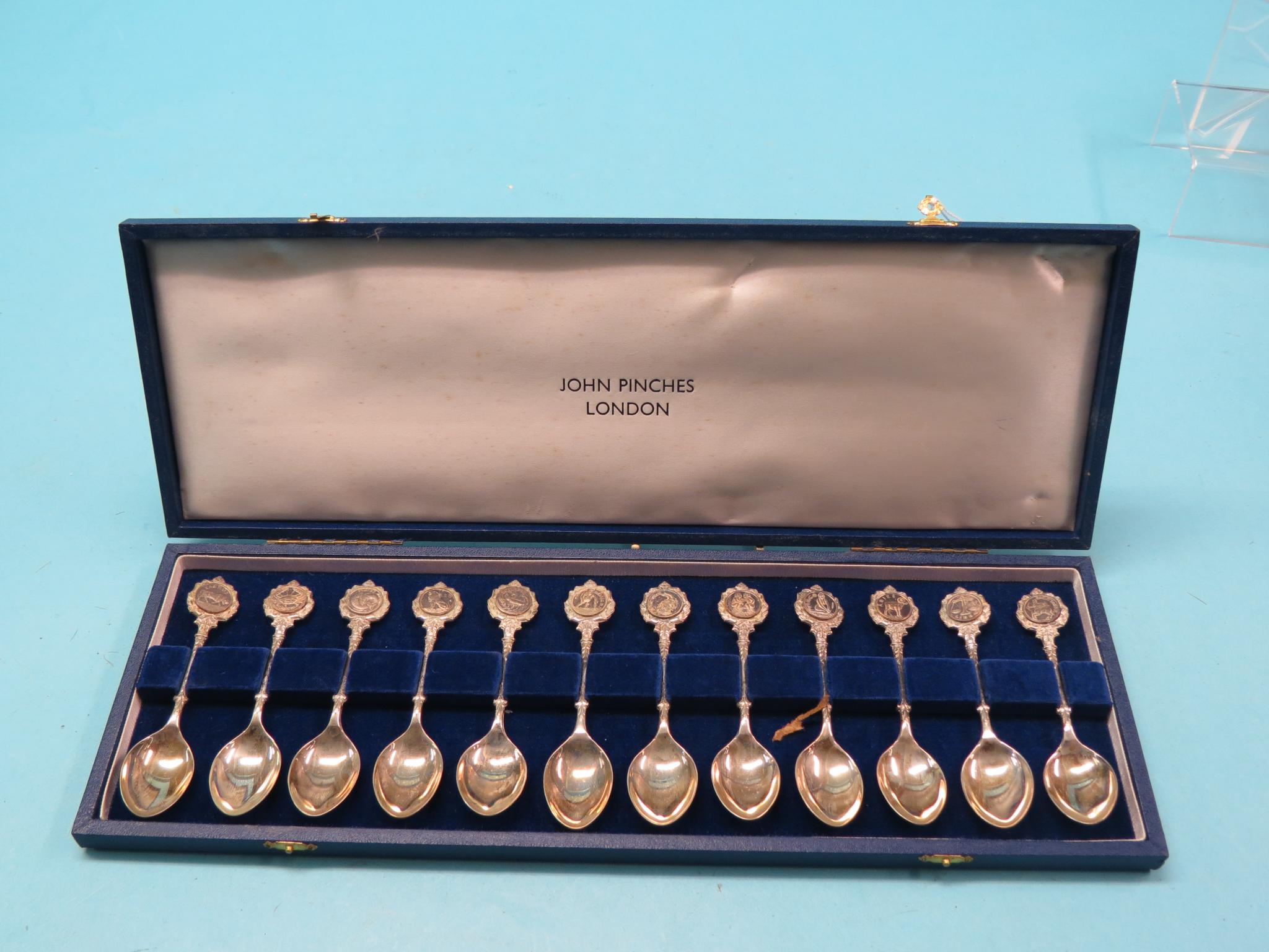 Appraisal: A set of twelve silver teaspoons signs of the zodiac