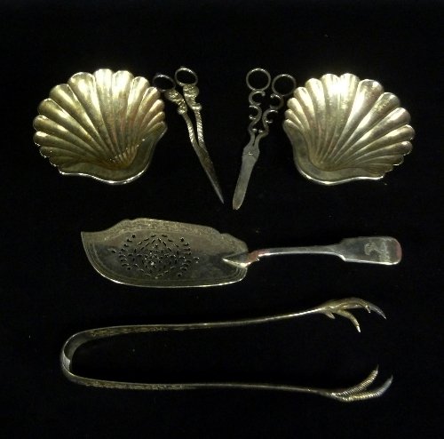 Appraisal: A pair of plated butter shells each raised on three