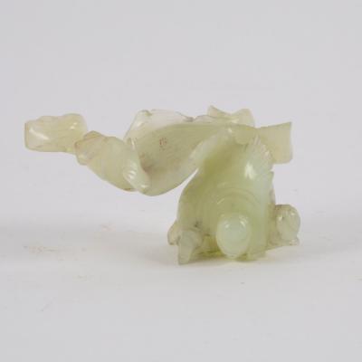 Appraisal: A th Century Chinese pale celadon jade carving golden carp