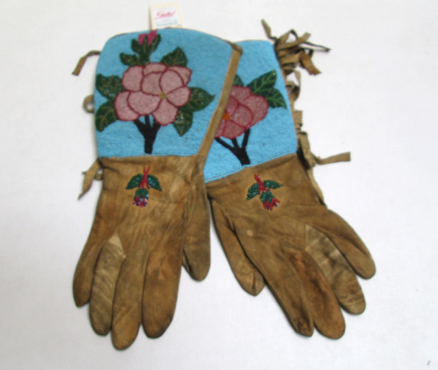 Appraisal: NATIVE AMERICAN BEADED BUCKSKIN GAUNTLETS the Indigenous peoples of the