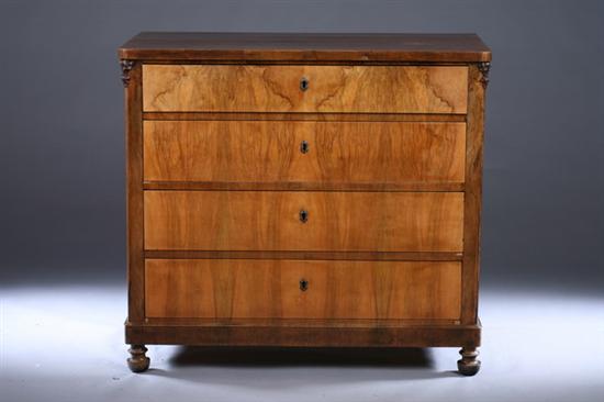 Appraisal: CONTINENTAL BIEDERMEIER WALNUT CHEST OF DRAWERS th century Rounded-corner plinth