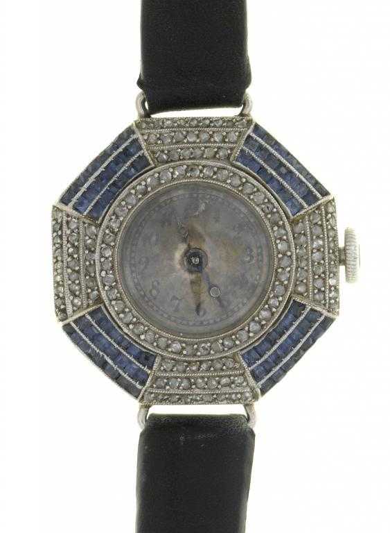 Appraisal: AN ART DECO PLATINUM DIAMOND AND SAPPHIRE COCKTAIL WATCH with