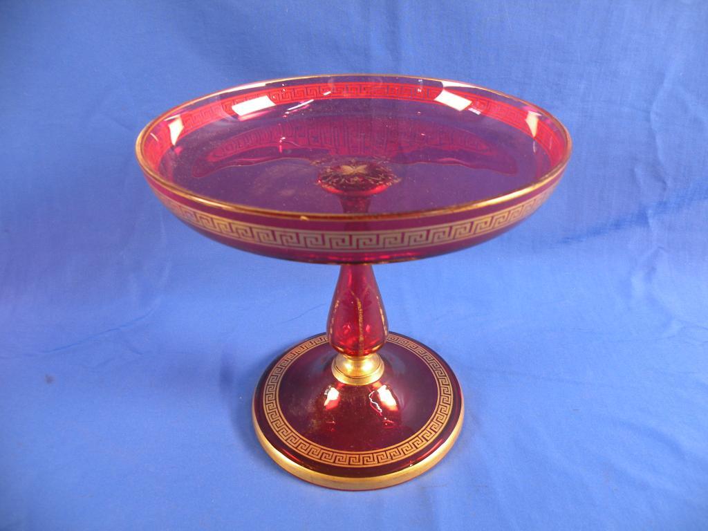 Appraisal: A Bohemian ruby tinted tazza decorated in gilt with Greek