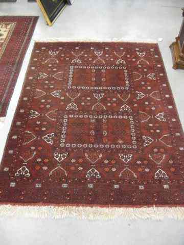 Appraisal: Belouchi Handmade Rug indigo ivory designs on deep burgundy field