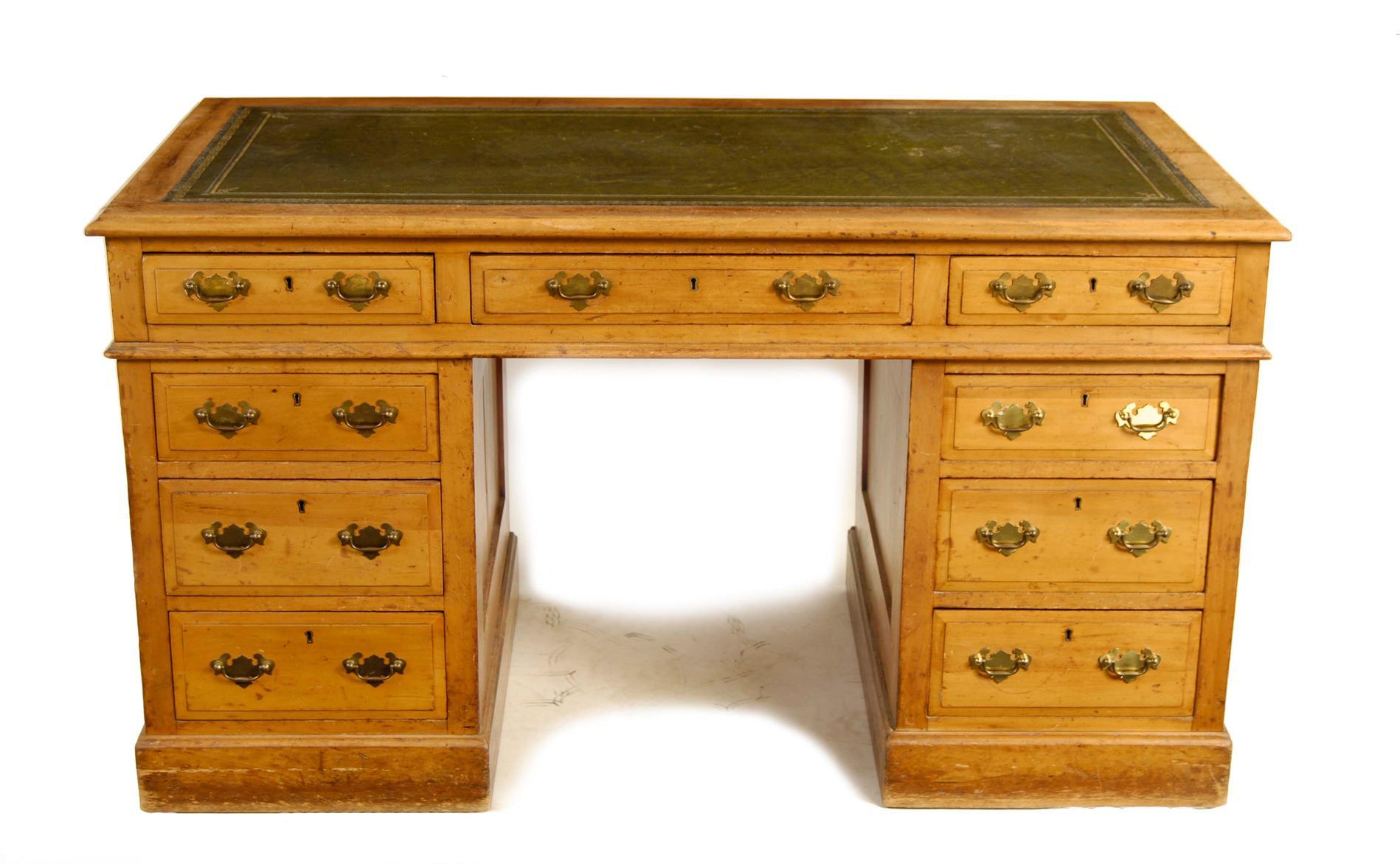 Appraisal: A satin walnut twin pedestal desk