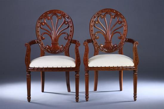 Appraisal: PAIR REGENCY STYLE CARVED MAHOGANY PLUME-BACK ARM CHAIRS th century