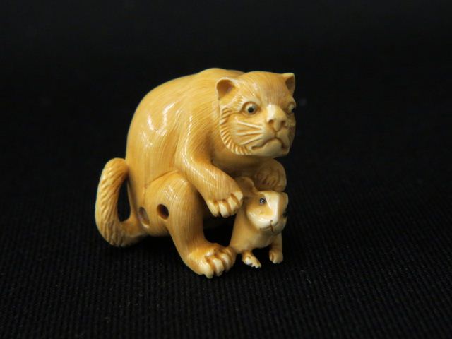 Appraisal: Carved Ivory Netsuke of a Cat with mouse signed excellent