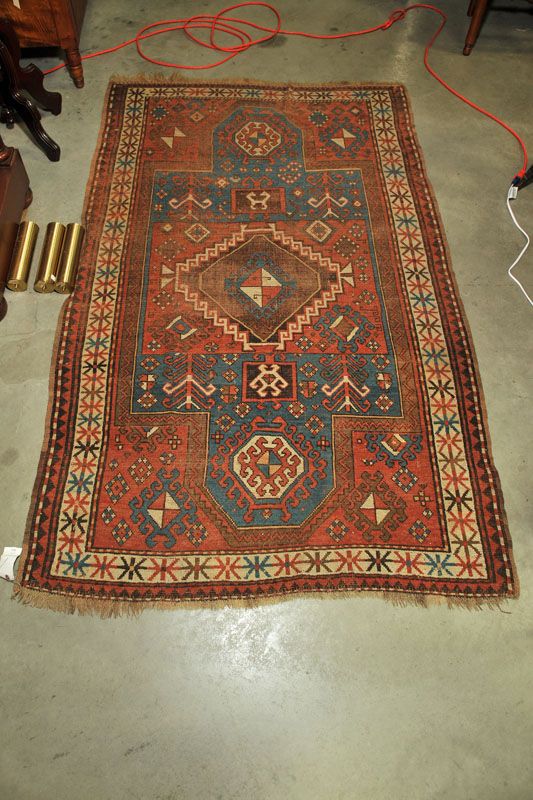 Appraisal: ORIENTAL STYLE AREA RUG Salmon ground with multiple borders and