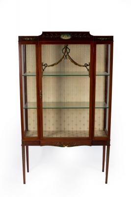 Appraisal: An Edwardian mahogany cushion top display cabinet the frieze painted