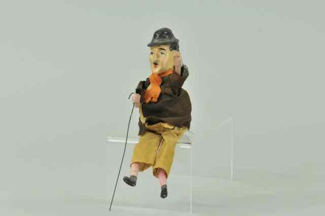 Appraisal: CHARLIE CHAPLIN FIGURE Early toy has hand painted composition head