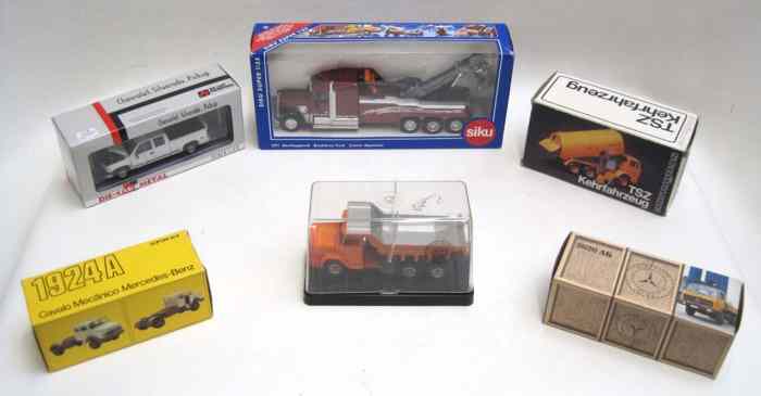 Appraisal: FIFTEEN DIECAST SCALE MODEL TRUCKS including Gescha Schorling TSZ Kehrfahrzeug