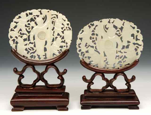 Appraisal: A PAIR OF CHINESE MUTTON FAT JADE TWO PIECE OVAL