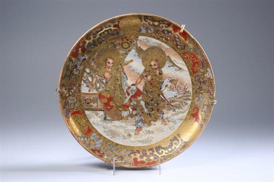 Appraisal: JAPANESE SATSUMA EARTHENWARE CHARGER Meiji period Painted to depict immortals