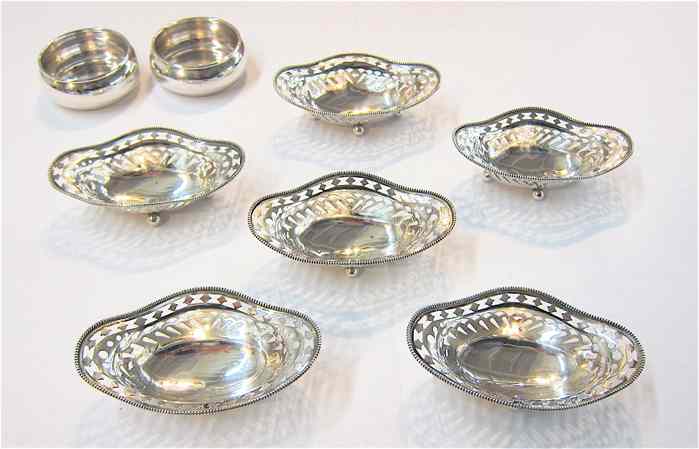 Appraisal: SET OF STERLING NUT CUPS PAIR STERLING SALTS pieces The