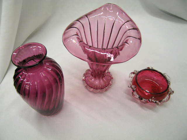 Appraisal: Pcs Cranberry Art Glass vases and a master salt cellar