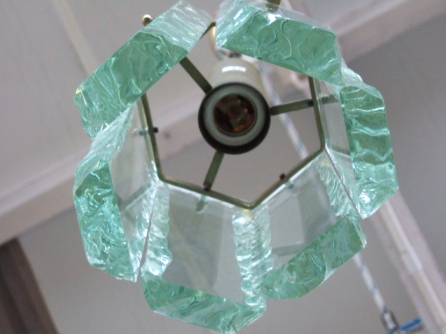 Appraisal: A Fontana Arte hanging light 's steel and chiselled glass