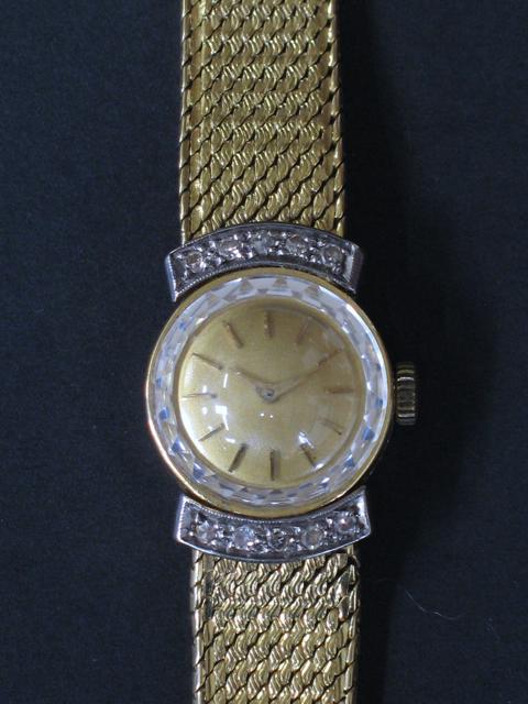 Appraisal: A LADY'S CONTINENTAL YELLOW GOLD WRISTWATCH the gilt dial with