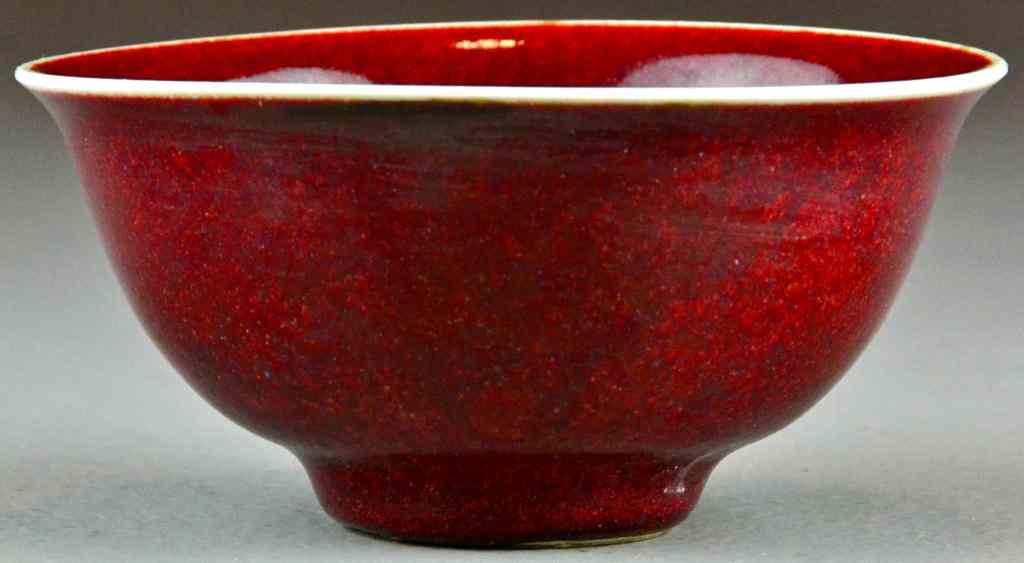 Appraisal: Chinese Oxblood Porcelain BowlWhite porcelain bowl with deep red glaze