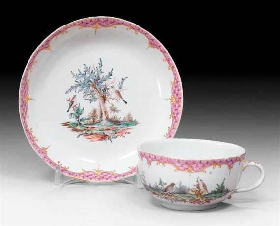 Appraisal: CUP AND SAUCER WITH BIRD DECORATION Nymphenburg circa Without marks