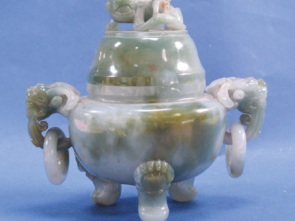 Appraisal: A CHINESE MOTTLED CELADON JADE CENSER AND COVER the domed