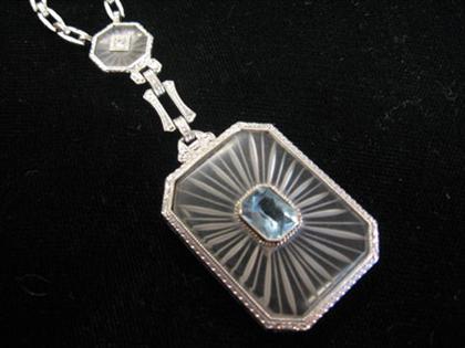 Appraisal: White gold neck chain with glass blue stone and diamond