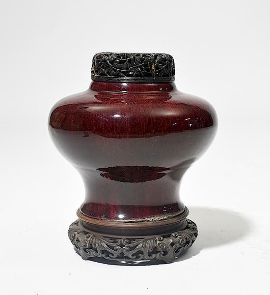 Appraisal: th C Chinese oxblood red glaze jar with carved wooden